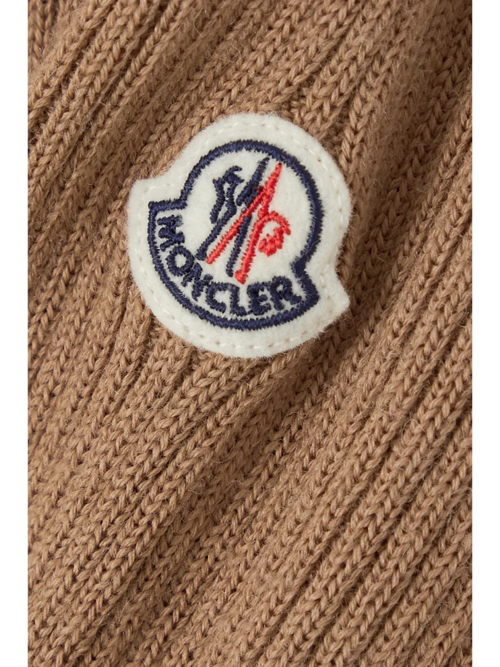 Close-up detail of the Moncler Ribbed Wool-blend Midi Dress