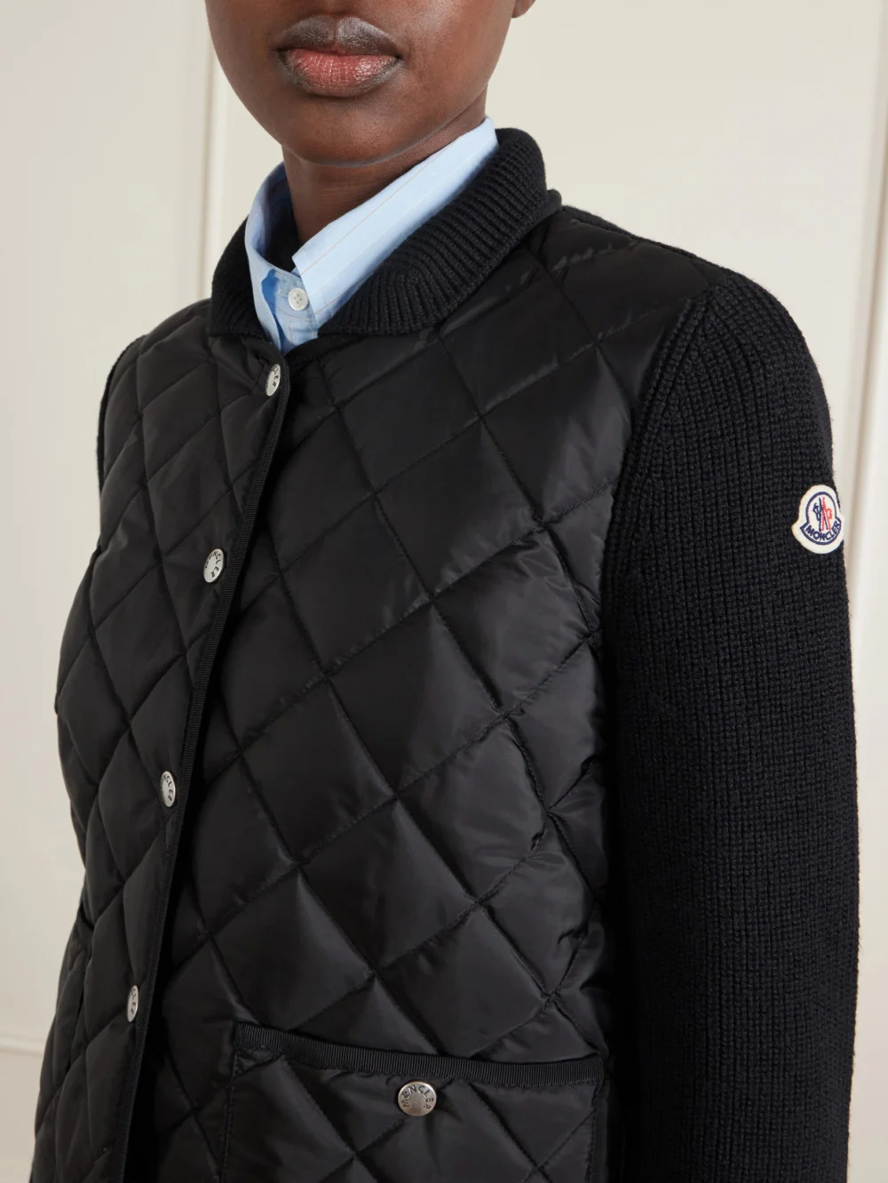 Close-up detail of the Moncler Ribbed Wool-trimmed Quilted Shell Down Cardigan