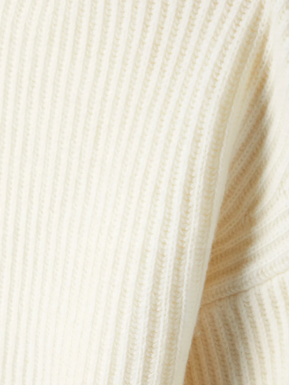 Close-up detail of the Moncler Ribbed Wool Turtleneck Sweater