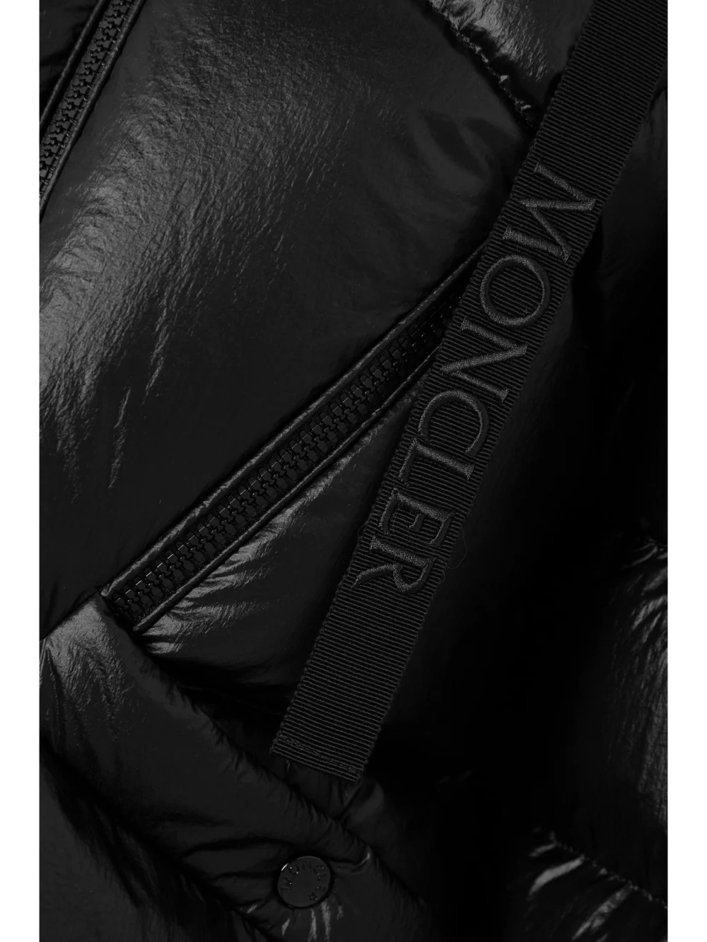 Close-up detail of the Moncler Seine Hooded Quilted Padded Glossed-shell Down Jacket