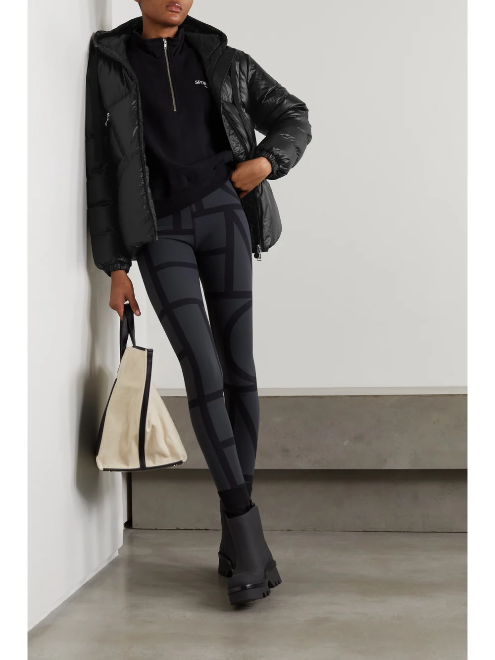 Moncler Seine Hooded Quilted Padded Glossed-shell Down Jacket, worn by a model