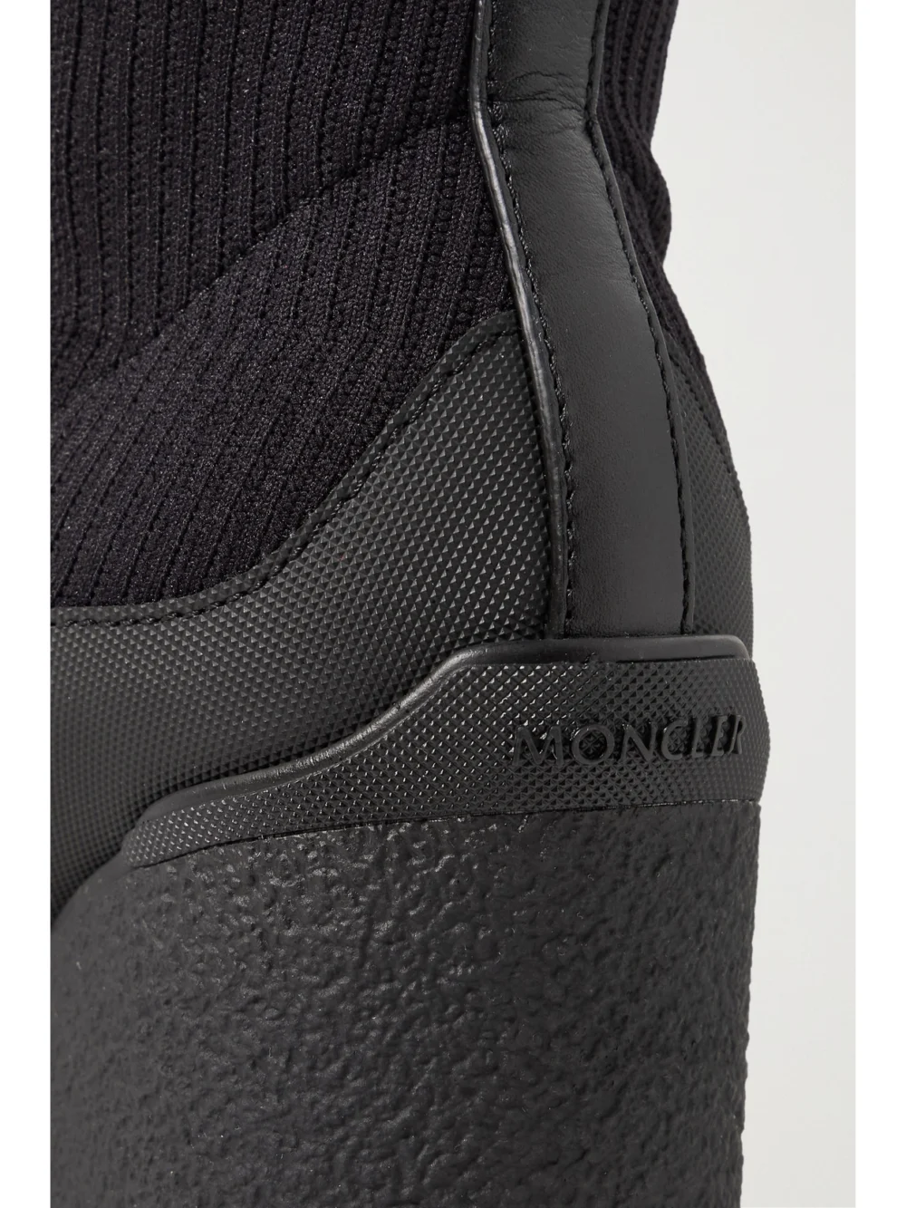 Close-up detail of the Moncler Splora Leather and Rubber-trimmed Ribbed Stretch-knit Ankle Boots