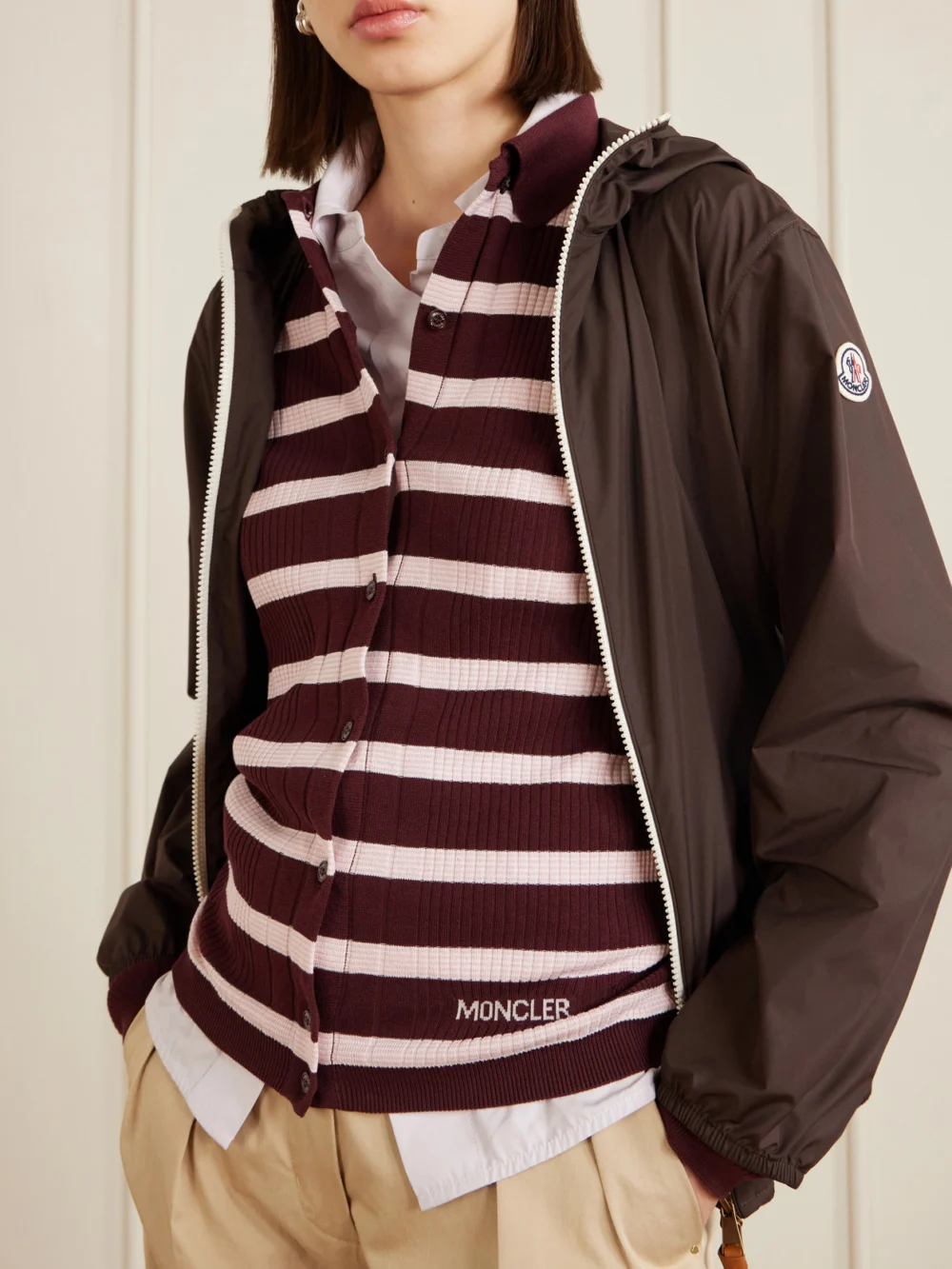 Close-up detail of the Moncler Striped Ribbed Cotton Polo Shirt