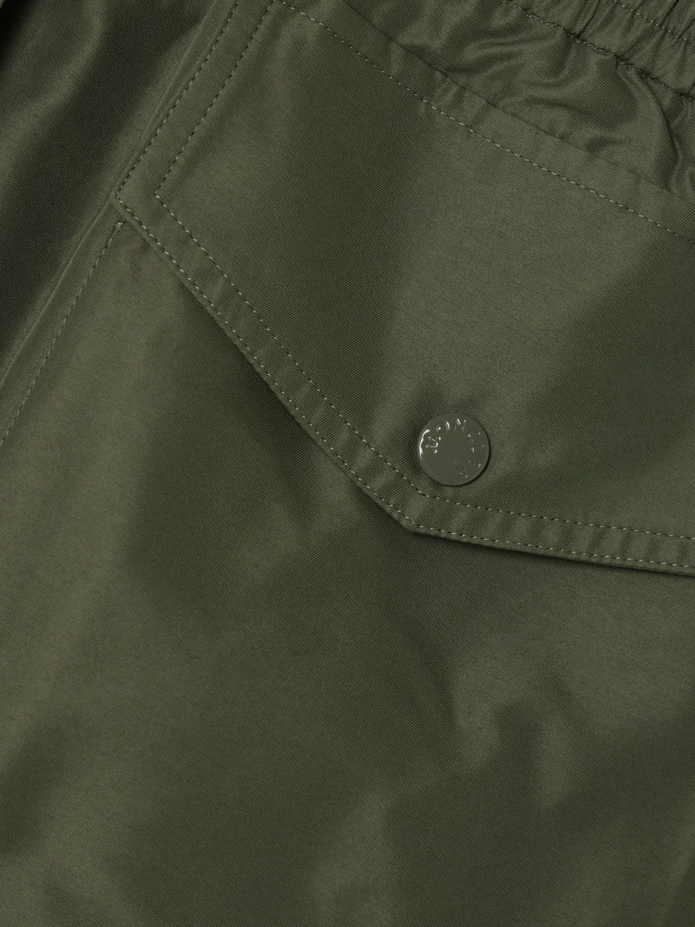 Close-up detail of the Moncler Taffeta Cargo Mini Skirt