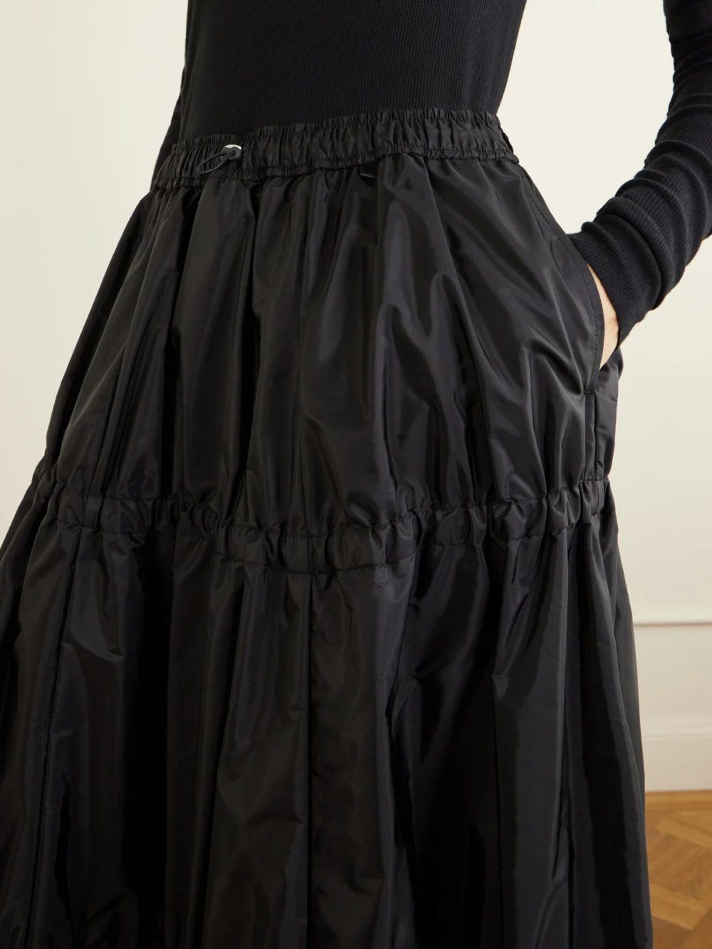 Close-up detail of the Moncler Tiered Shell Midi Skirt
