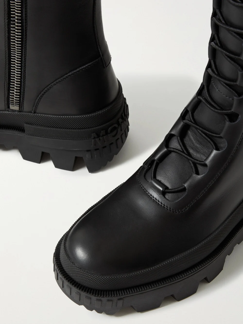 Close-up detail of the Moncler Vail Leather Lace-up Knee Boots
