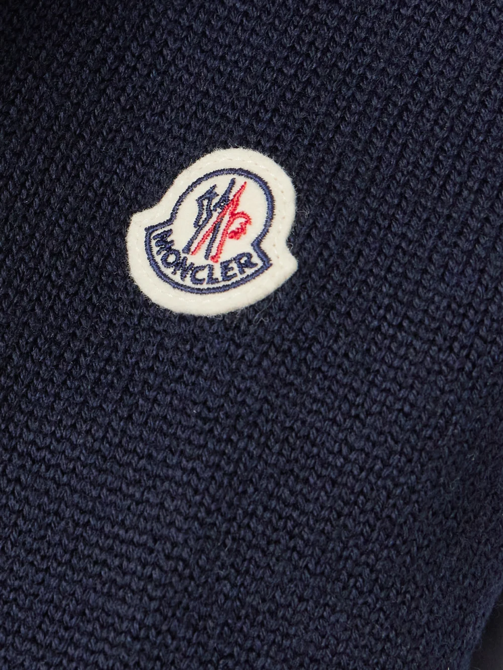 Close-up detail of the Moncler Wool and Padded Quilted Shell Down Cardigan