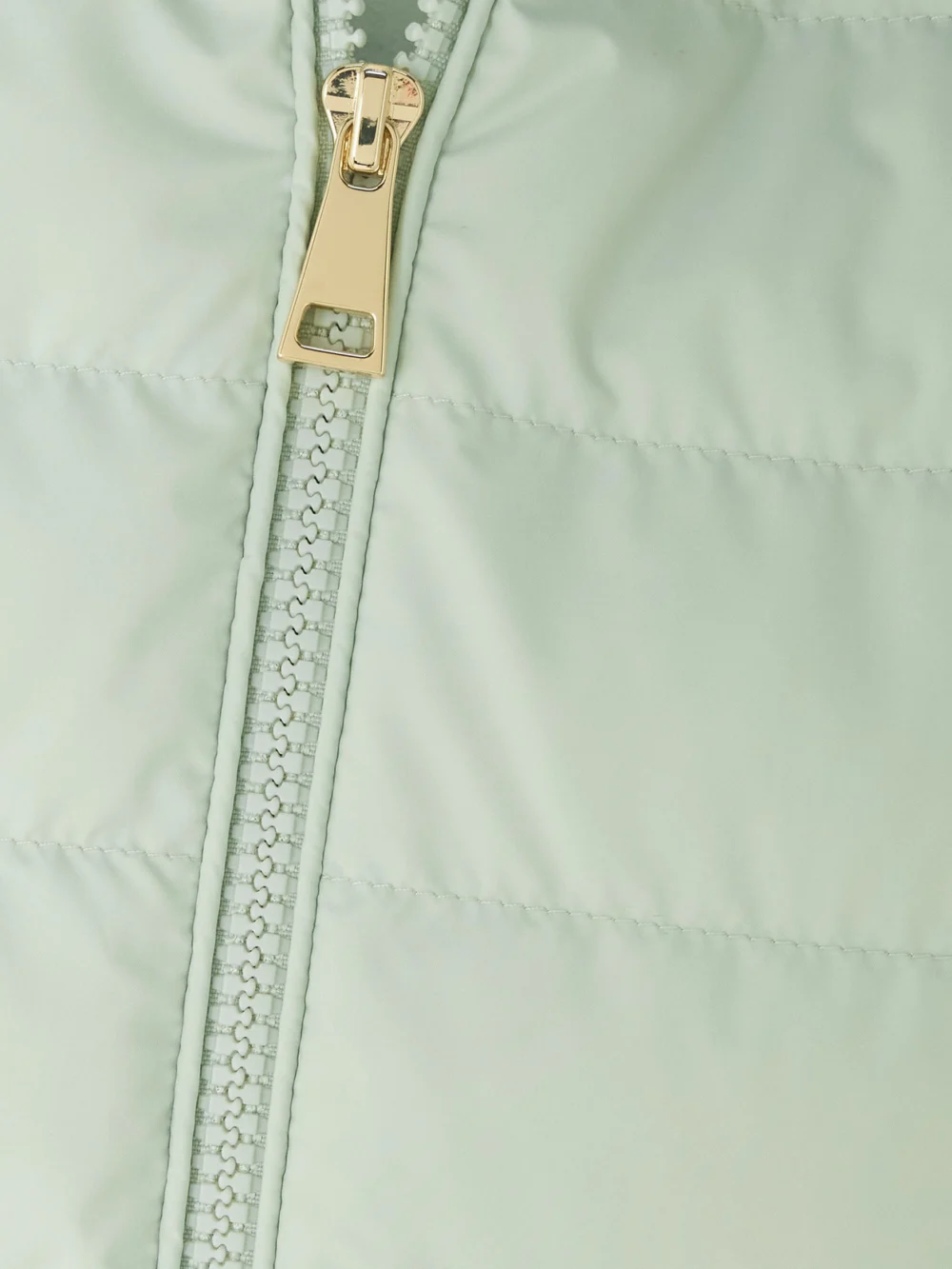 Close-up detail of the Moncler Wool and Padded Quilted Shell Down Cardigan