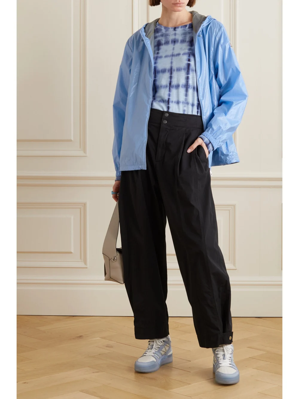 Moncler Wuisse Hooded Coated Cotton-blend Jacket, worn by a model
