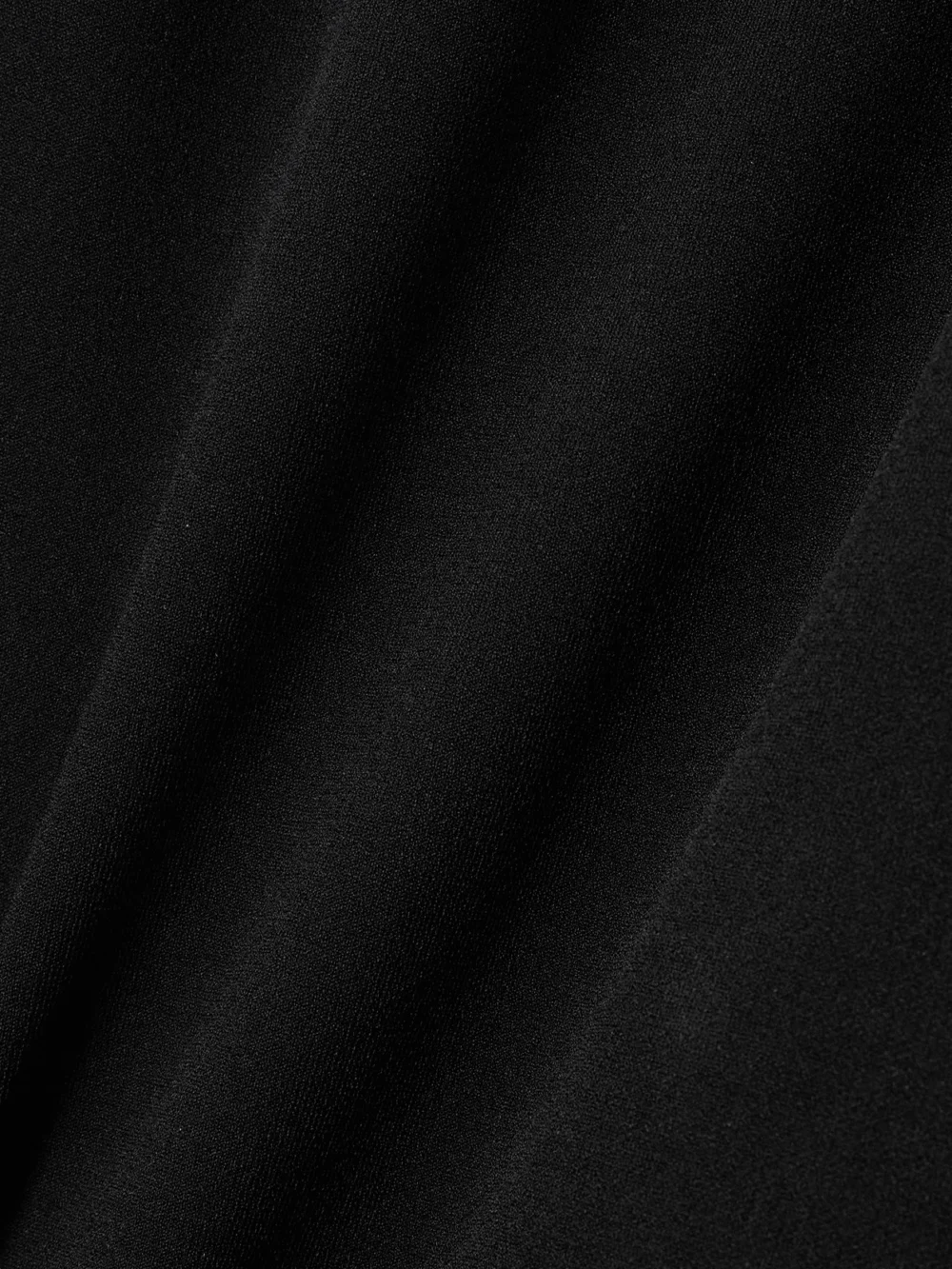 Close-up detail of the Mugler Asymmetric Stretch-knit Mini Dress