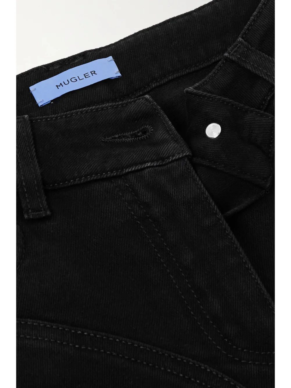 Close-up detail of the Mugler Mid-rise Flared Jeans