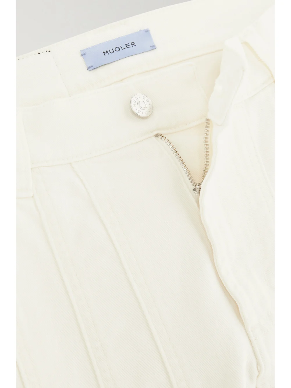 Close-up detail of the Mugler Paneled Straight-leg Jeans