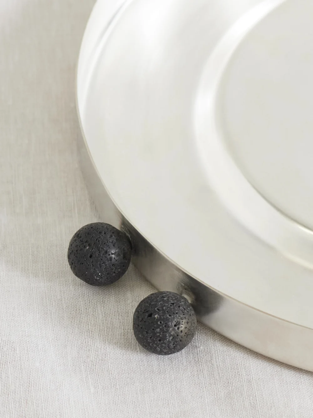 Close-up detail of the Natalia Criado Lava Silver-plated Plate