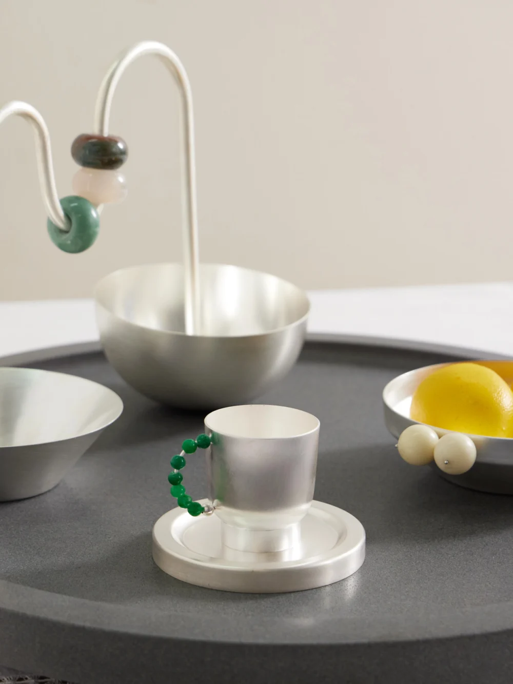 Natalia Criado Perlina Silver-plated Brass and Quartz Teacup and Saucer Set, styled view
