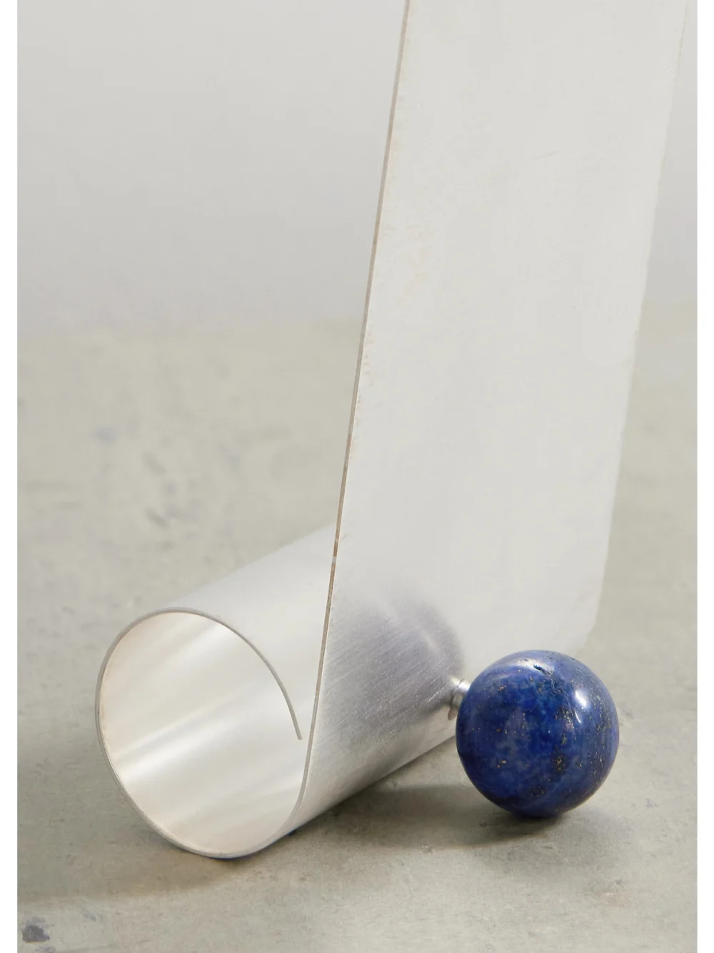 Close-up detail of the Natalia Criado Silver-plated and Lapis Lazuli Iphone Holder