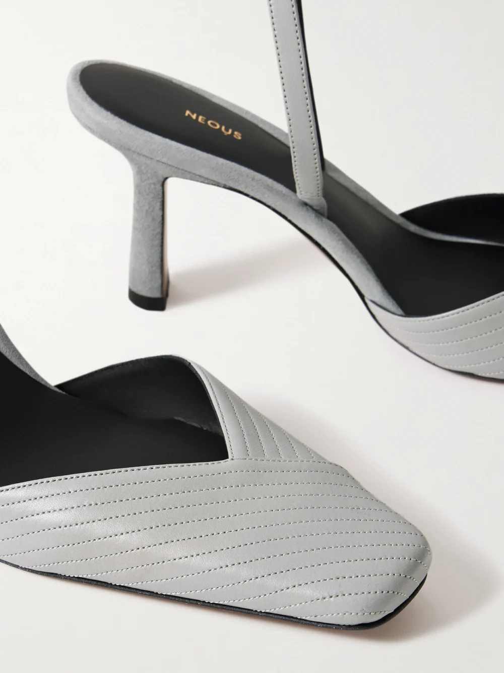 Close-up detail of the Neous Dilmun Suede-trimmed Leather Slingback Pumps