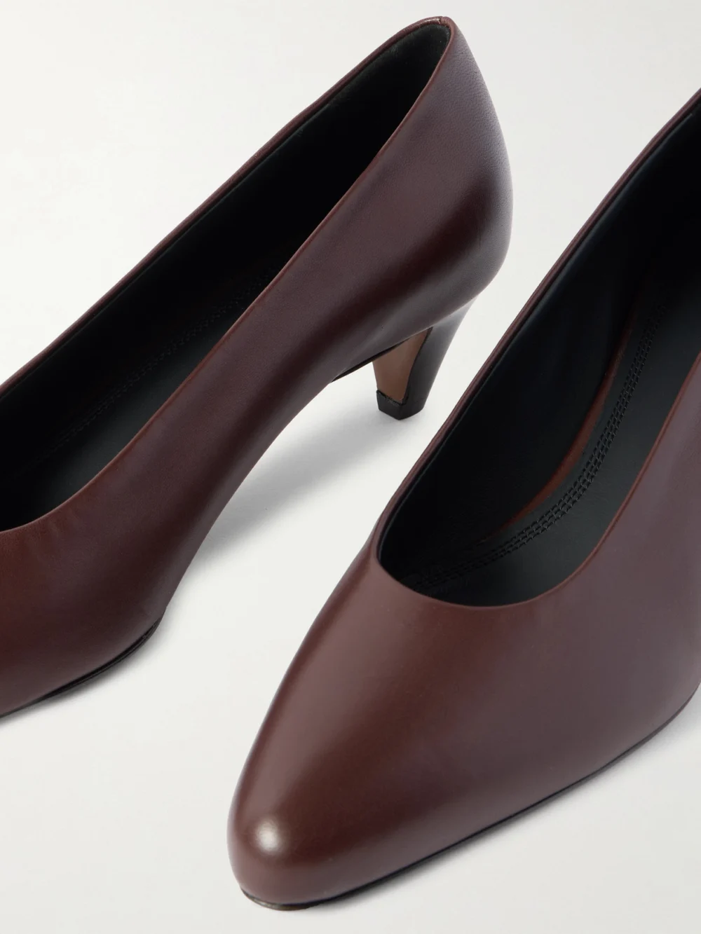Close-up detail of the Neous Fera Leather Pumps