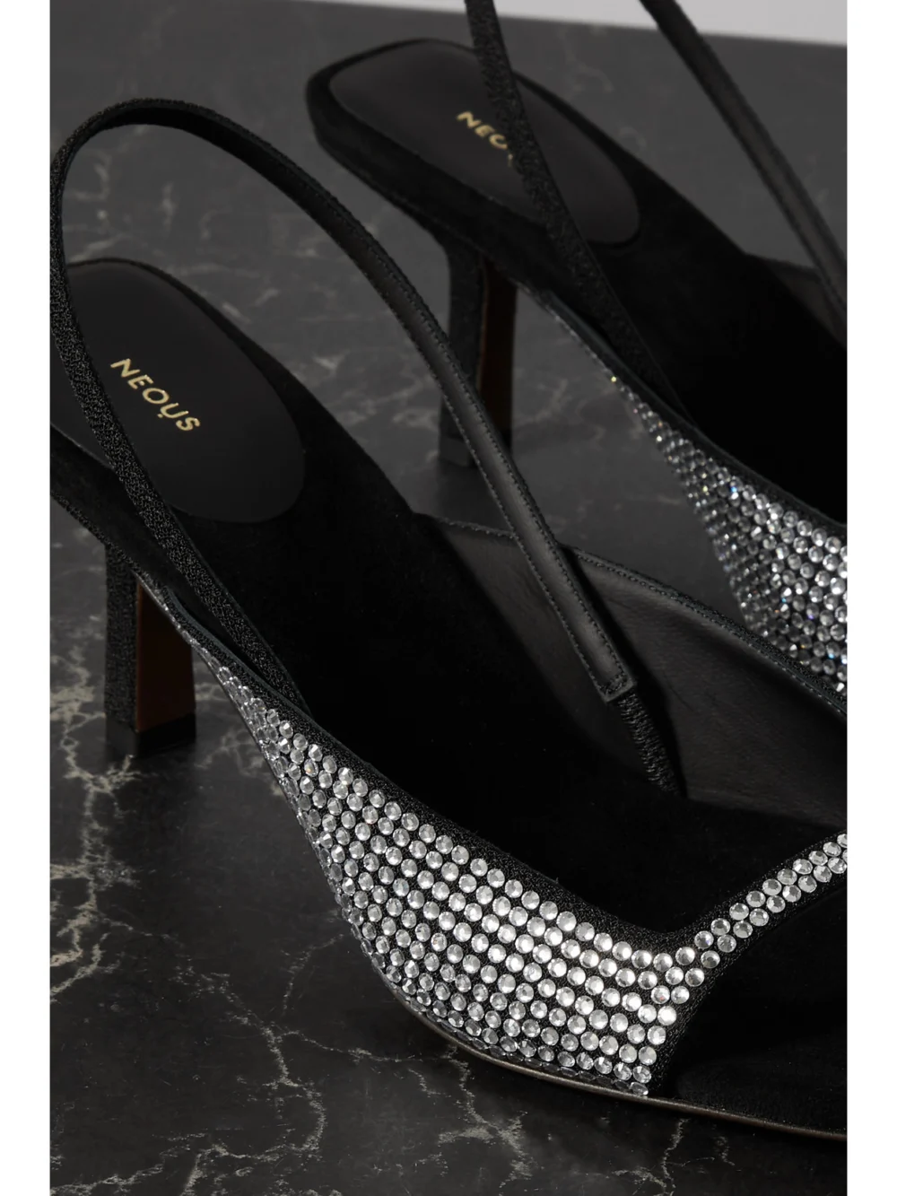Close-up detail of the Neous Kamui Crystal-embellished Leather Slingback Sandals