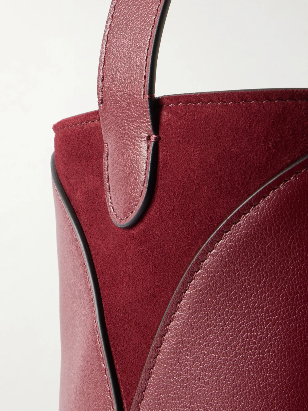 Close-up detail of the Neous Thea Suede-trimmed Leather Shoulder Bag