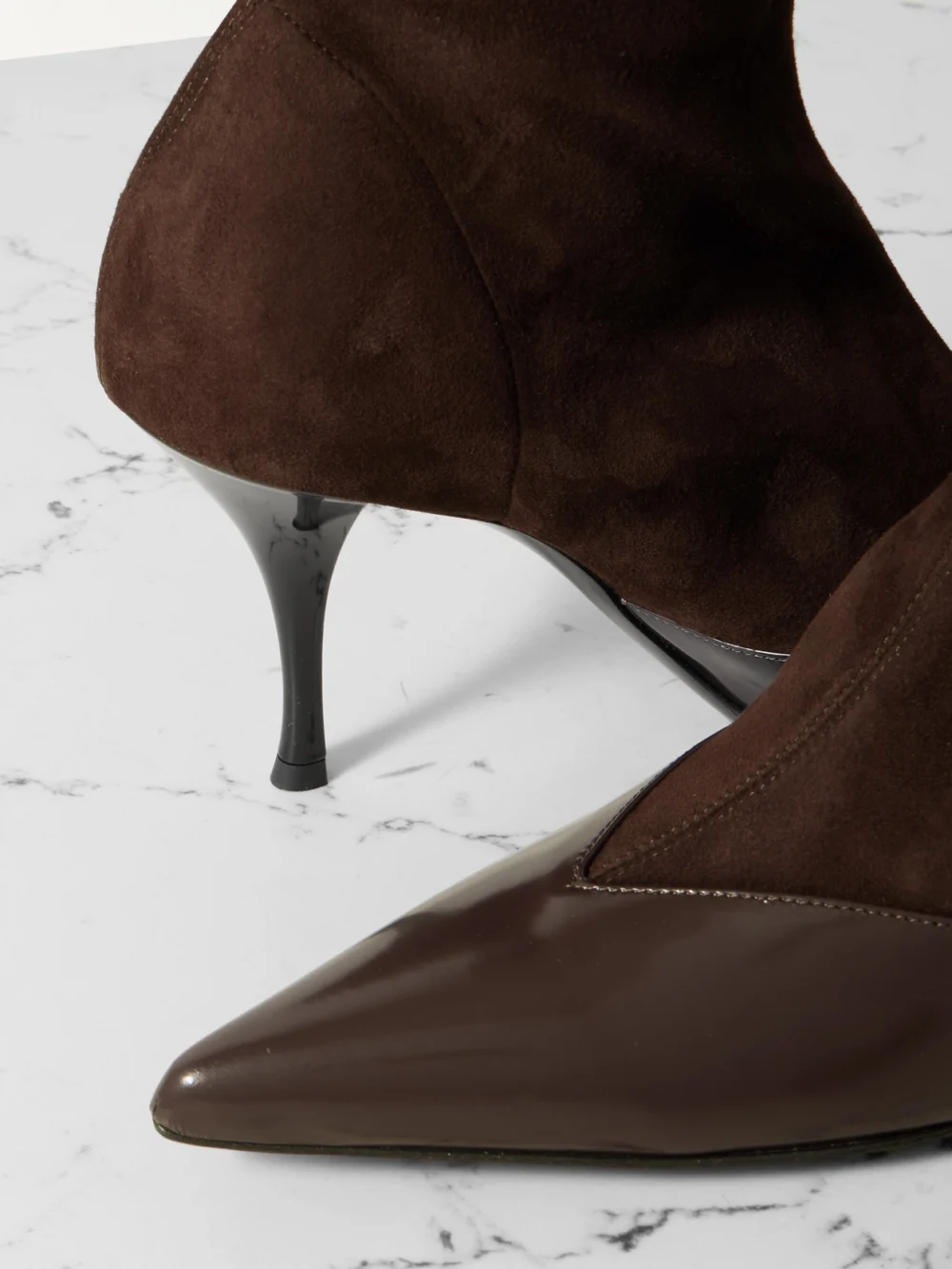 Close-up detail of the Neous Vega Paneled Leather-trimmed Suede Ankle Boots
