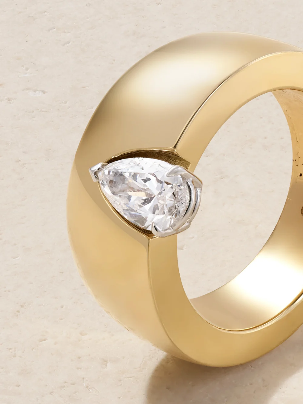 Close-up detail of the Nikos Koulis 18-karat Gold Diamond Ring