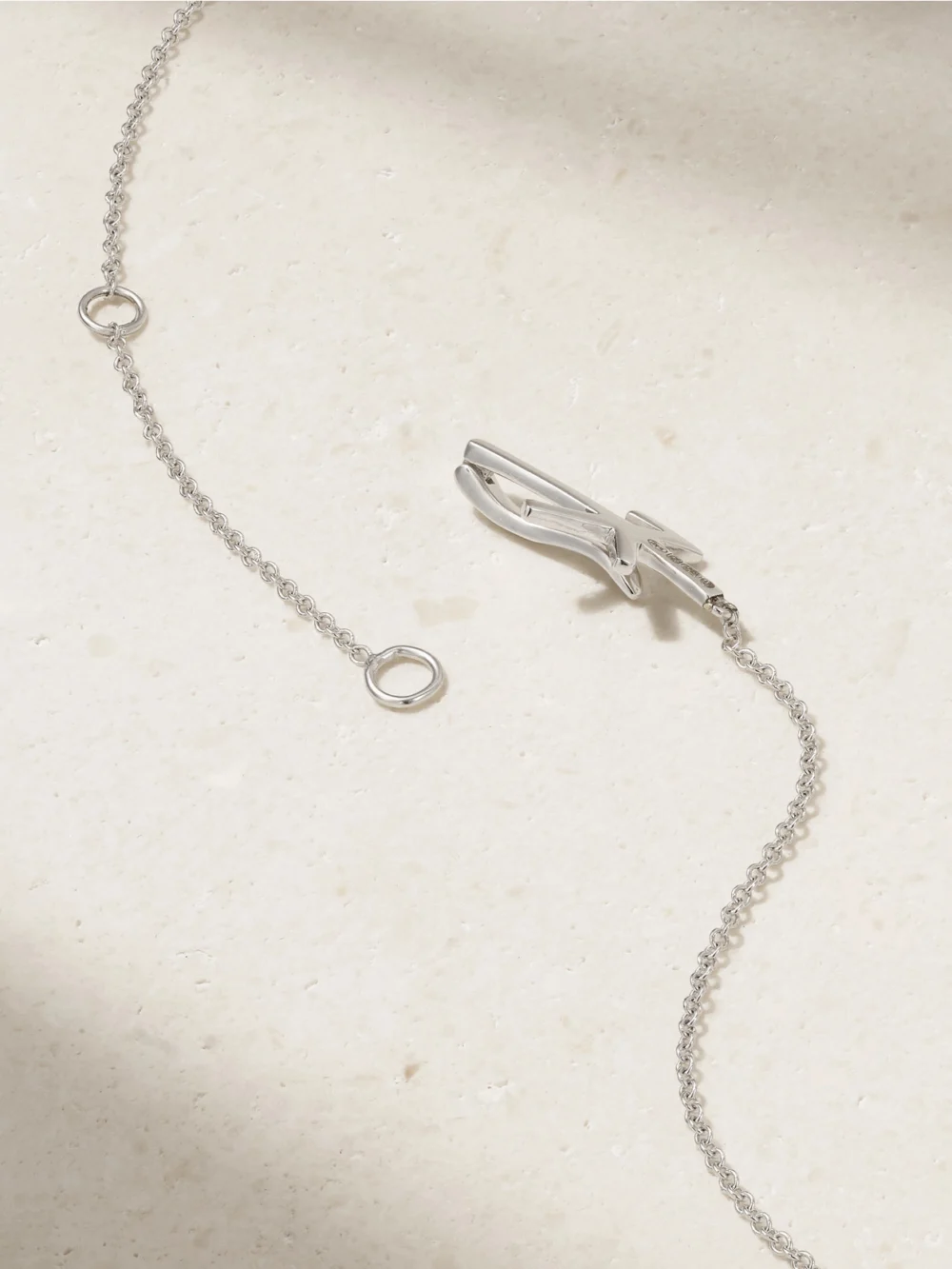 Back view of the Nikos Koulis Oui 18-karat White Gold, Diamond and Enamel Necklace
