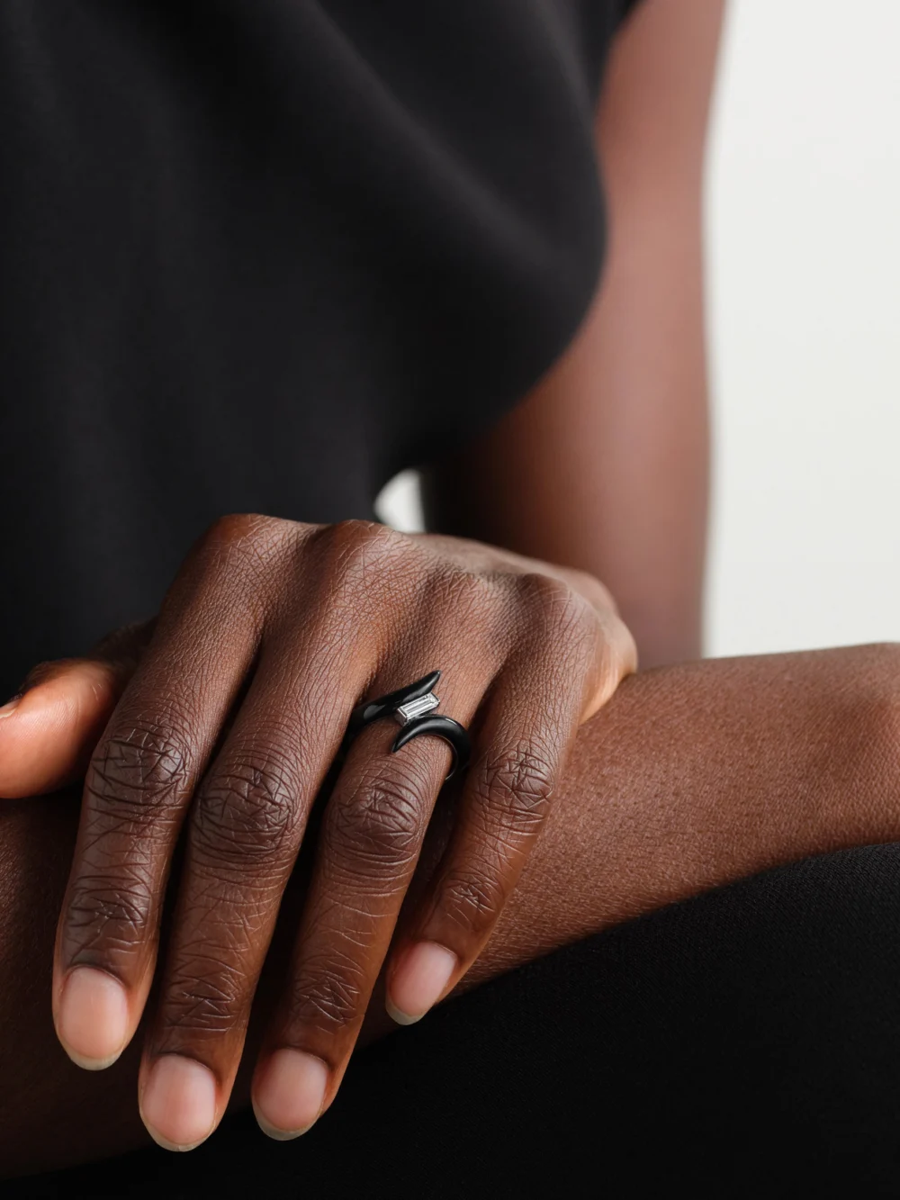 Nikos Koulis Oui 18-karat White Gold, Diamond and Enamel Ring, styled view