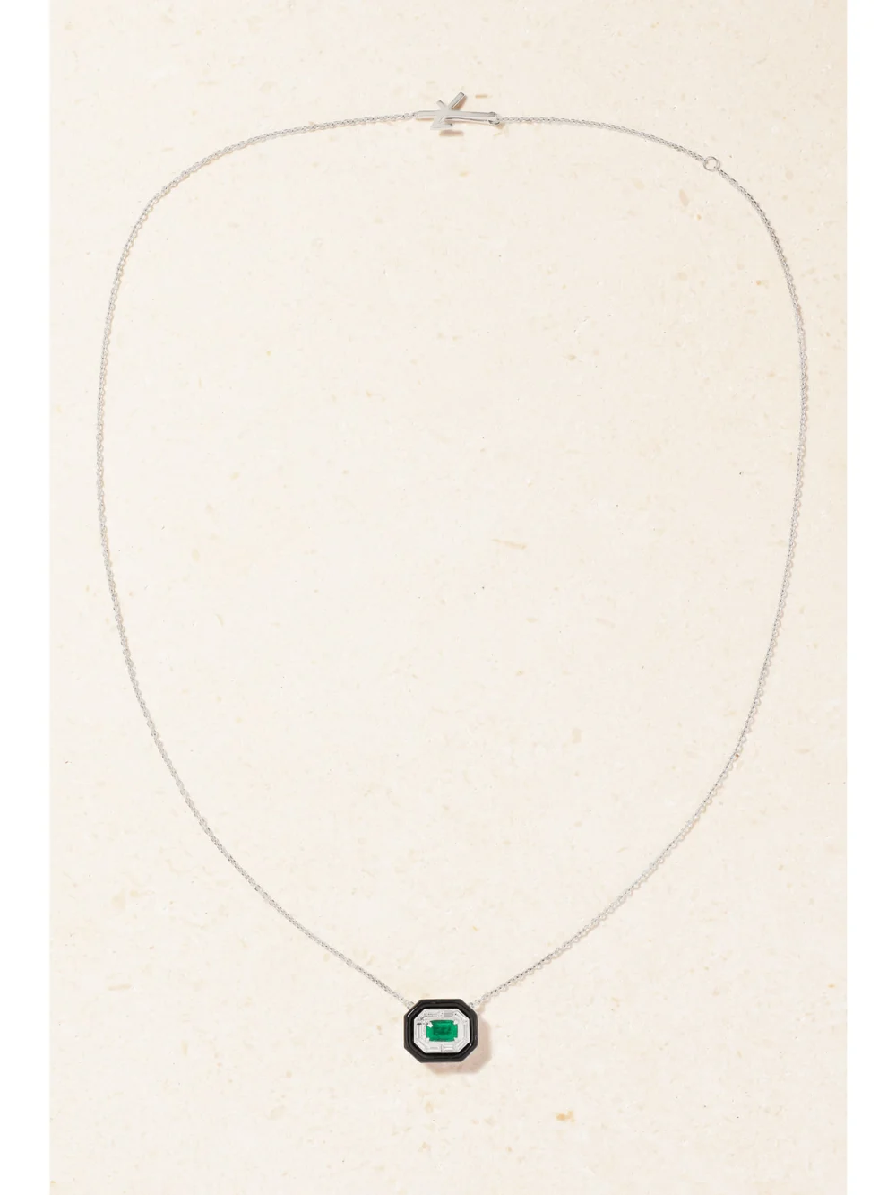Close-up detail of the Nikos Koulis Oui 18-karat White Gold, Emerald, Diamond and Enamel Necklace