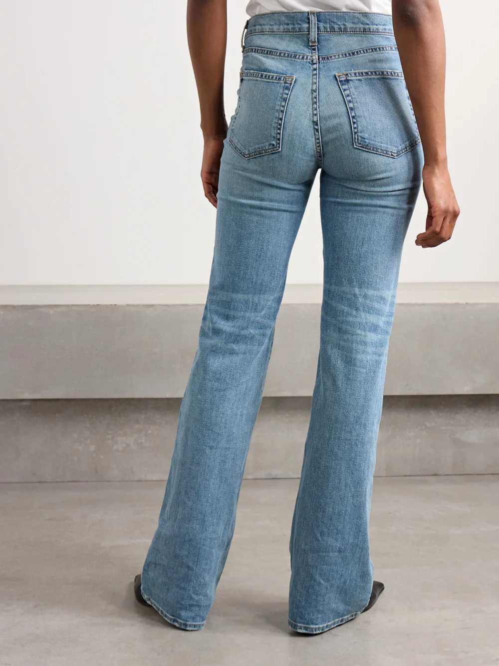 Back view of the Nili Lotan Celia High-rise Flared Jeans