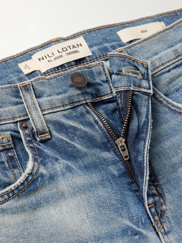 Close-up detail of the Nili Lotan Celia High-rise Flared Jeans