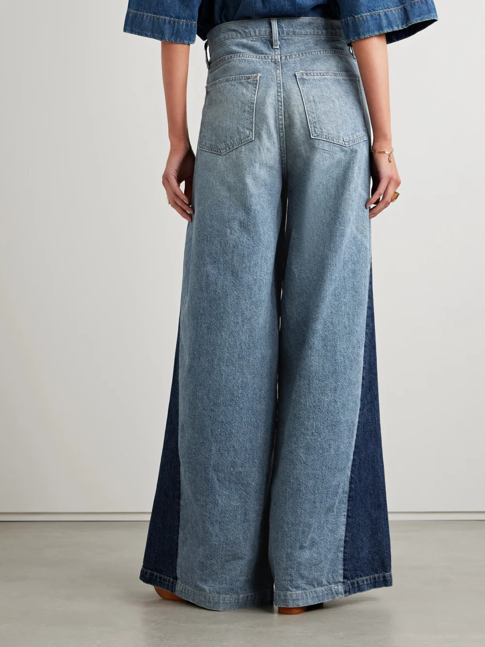 Back view of the Nili Lotan Ebony Paneled Two-tone High-rise Wide-leg Jeans