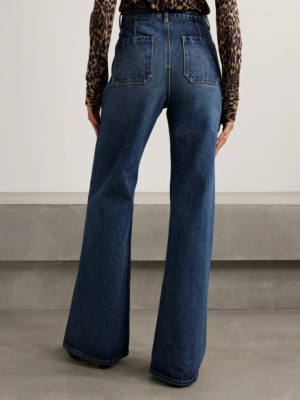 Back view of the Nili Lotan Edira High-rise Flared Jeans