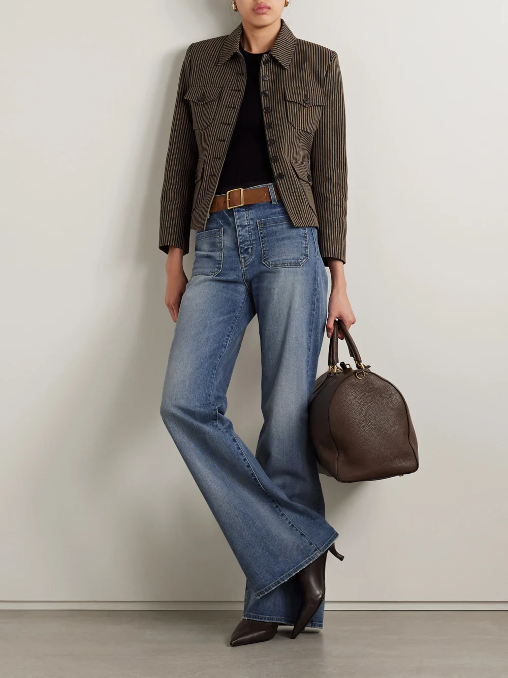 Nili Lotan Florence Distressed High-rise Flared Jeans, worn by a model