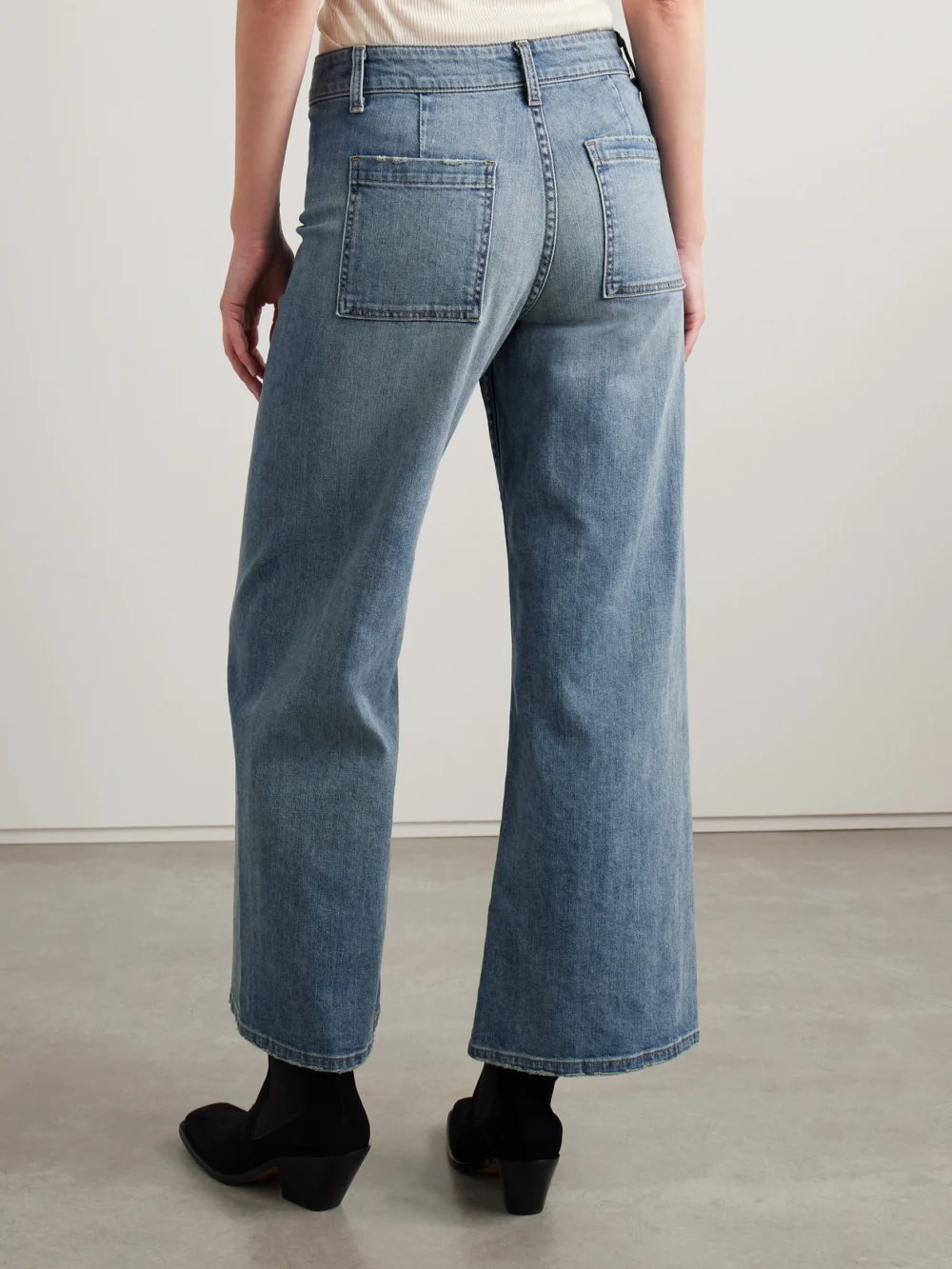 Back view of the Nili Lotan Megan Distressed High-rise Wide-leg Jeans