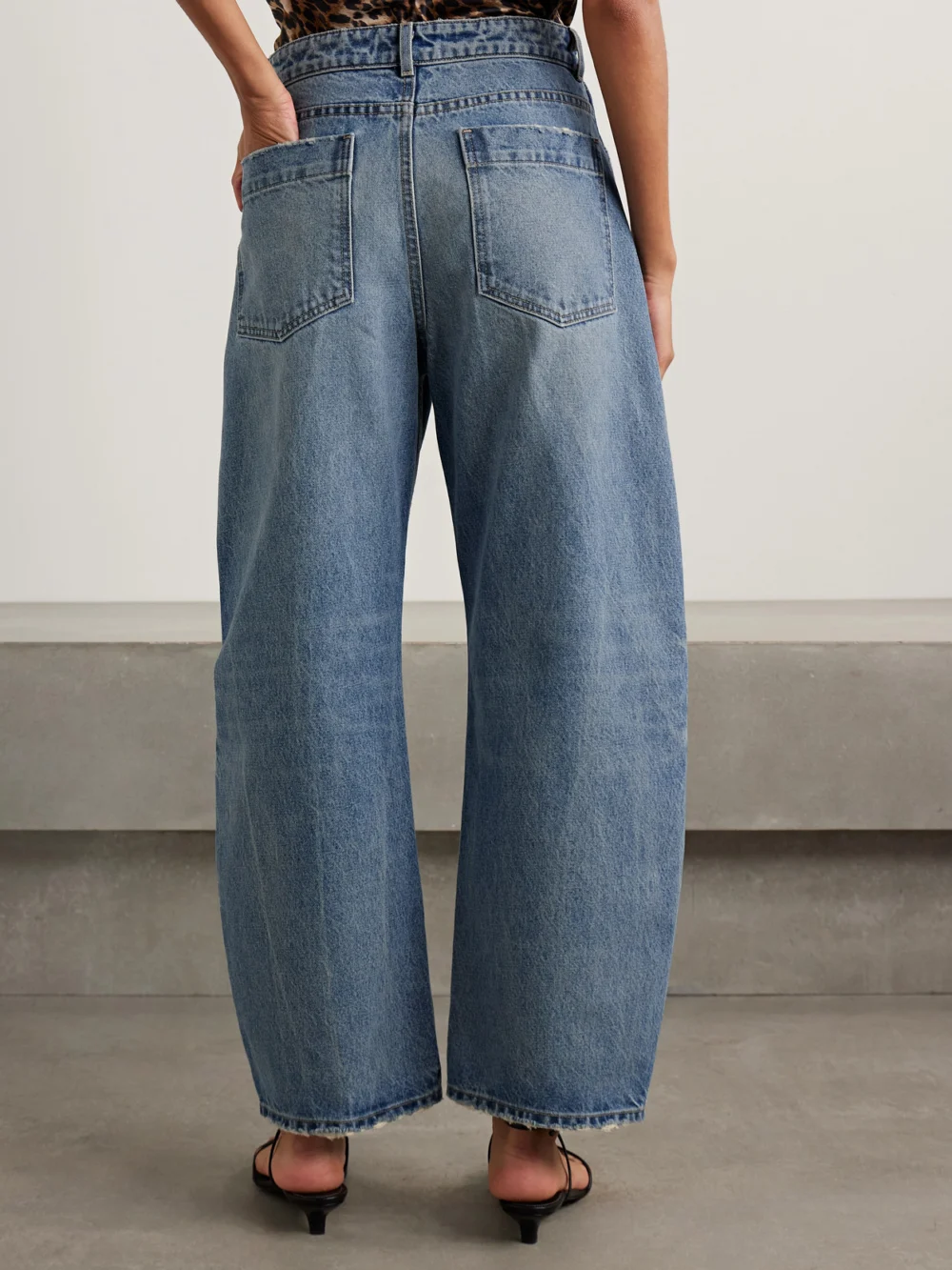 Back view of the Nili Lotan Otis Mid-rise Barrel-leg Jeans