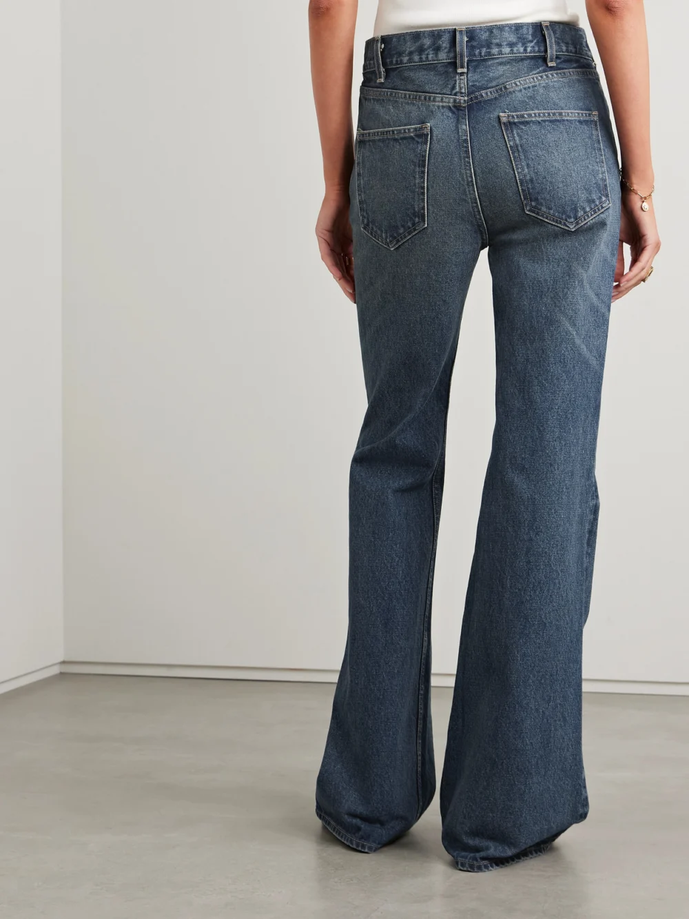 Back view of the Nili Lotan Roe Mid-rise Flared Jeans