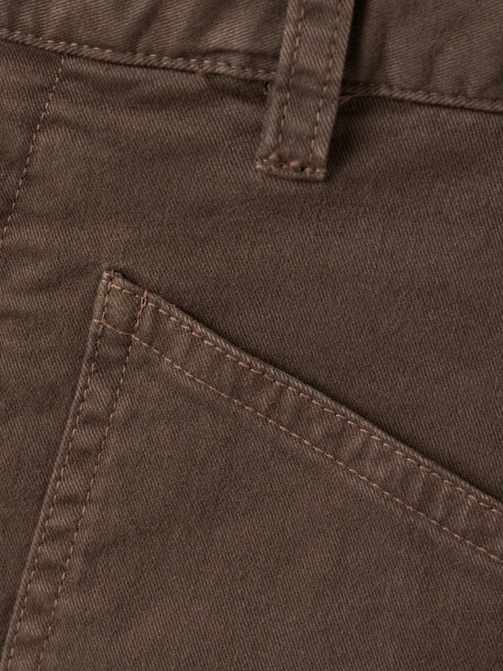 Close-up detail of the Nili Lotan Shon Brushed Stretch-cotton Twill Barrel-leg Pants
