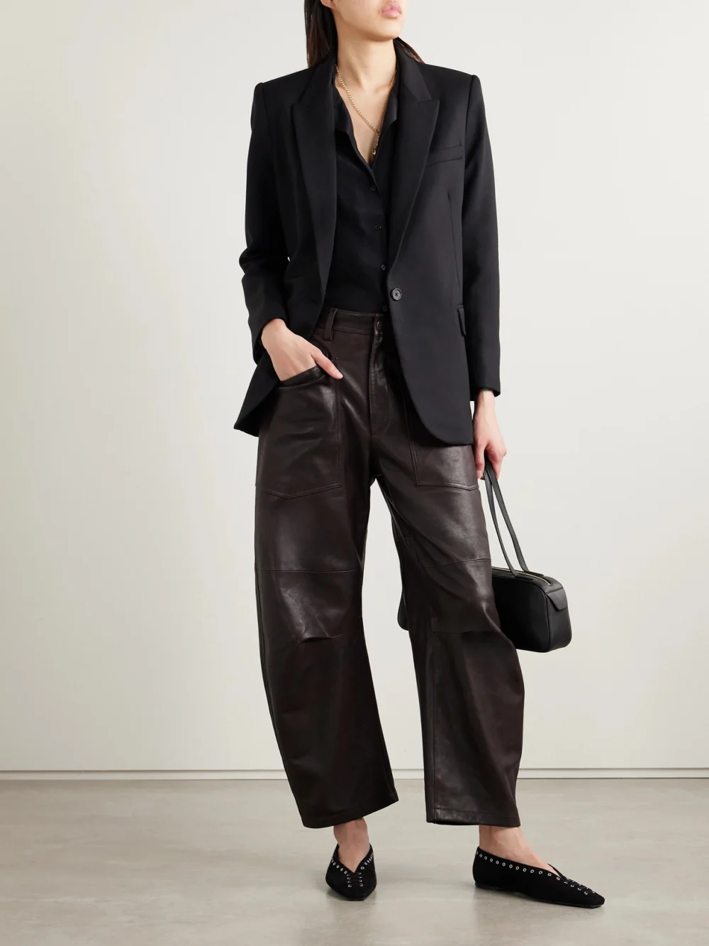 Nili Lotan Shon Leather Barrel-leg Pants, worn by a model