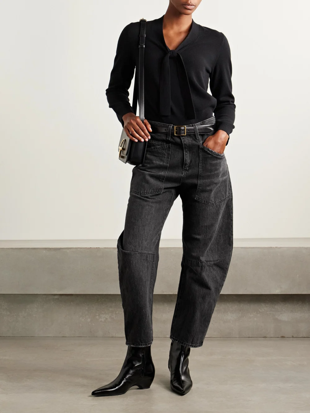 Nili Lotan Shon Mid-rise Barrel-leg Jeans, worn by a model