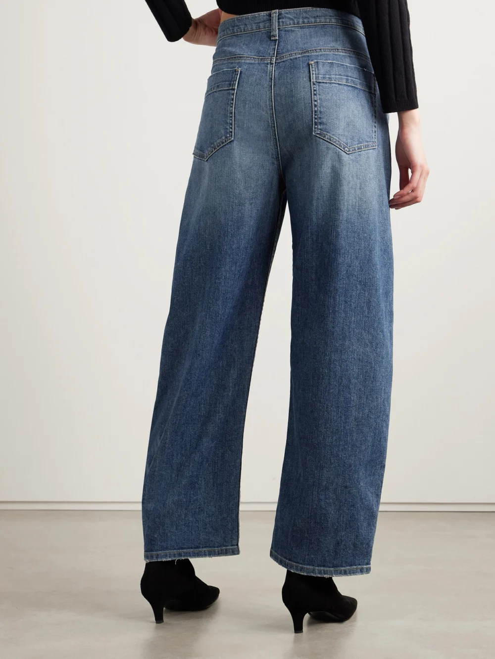Back view of the Nili Lotan Tribeca High-rise Tapered Jeans