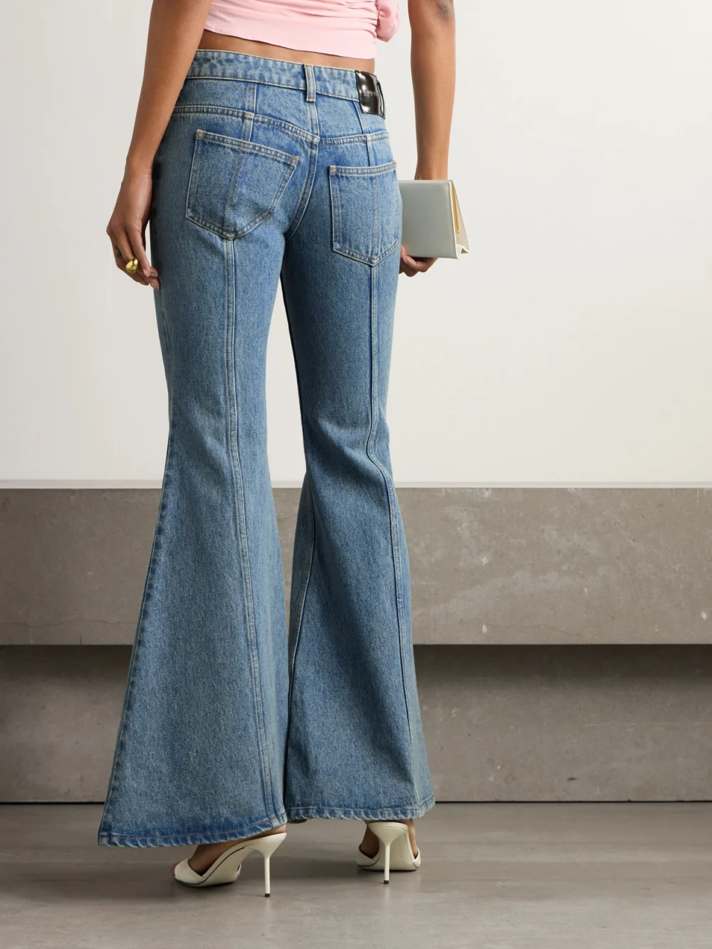 Back view of the Nina Ricci Paneled Mid-rise Flared Jeans