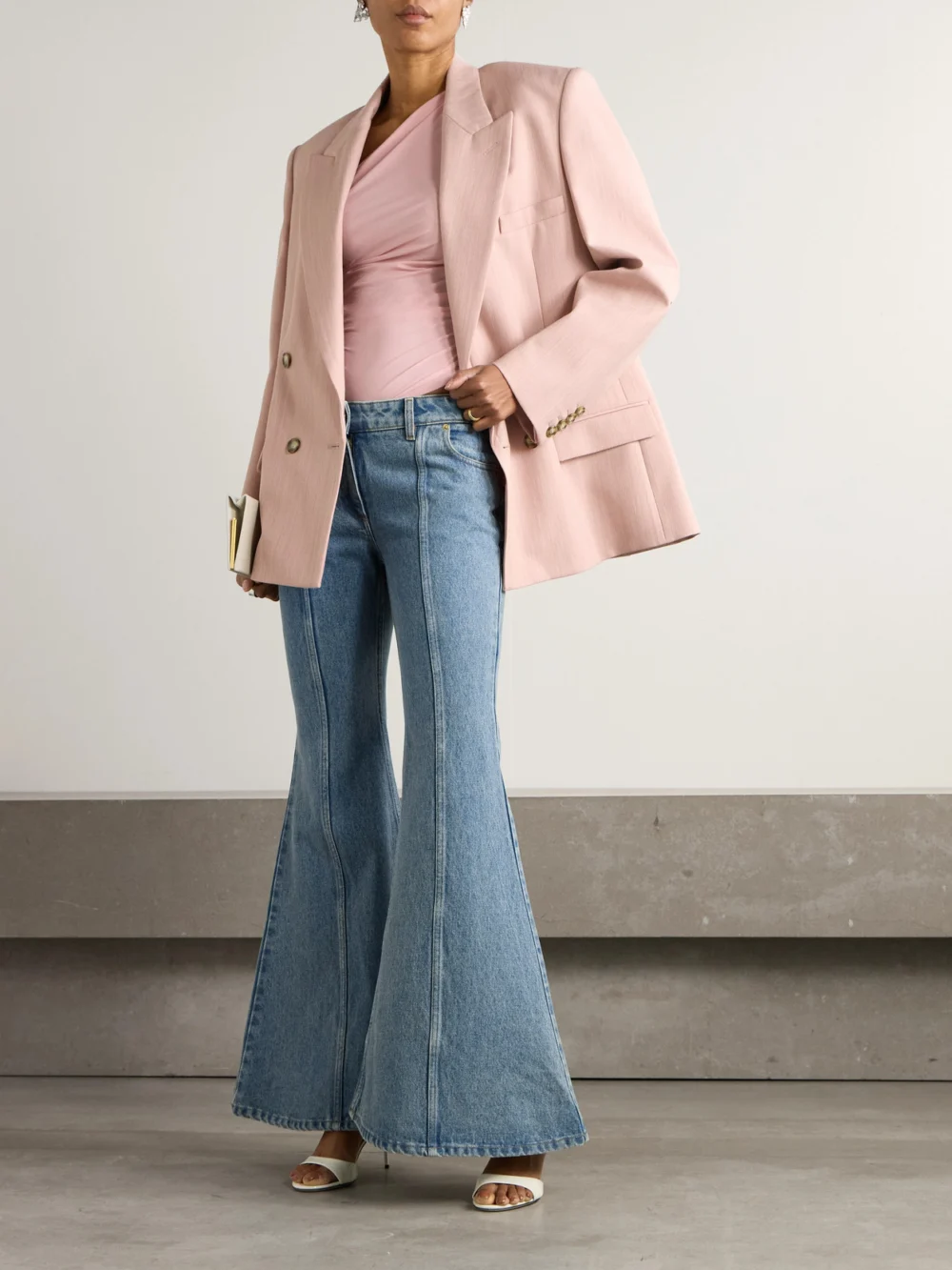 Nina Ricci Paneled Mid-rise Flared Jeans, worn by a model