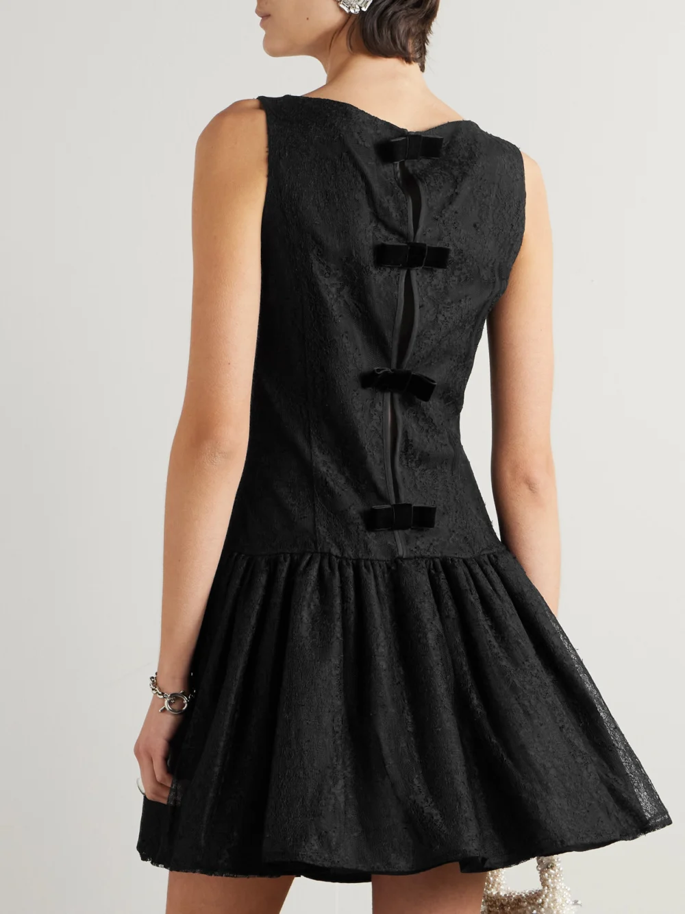 Back view of the Nina Ricci Velvet-trimmed Bow-detailed Gathered Chantilly Lace Mini Dress