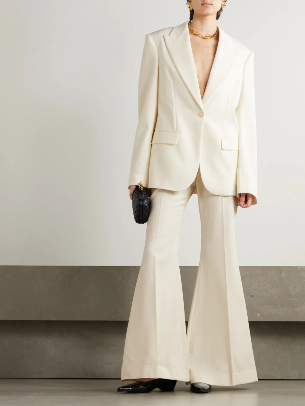 Nina Ricci Wool-gabardine Flared Pants, worn by a model