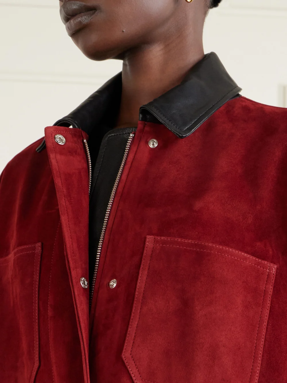 Close-up detail of the Nour Hammour Barn Leather-trimmed Suede Jacket