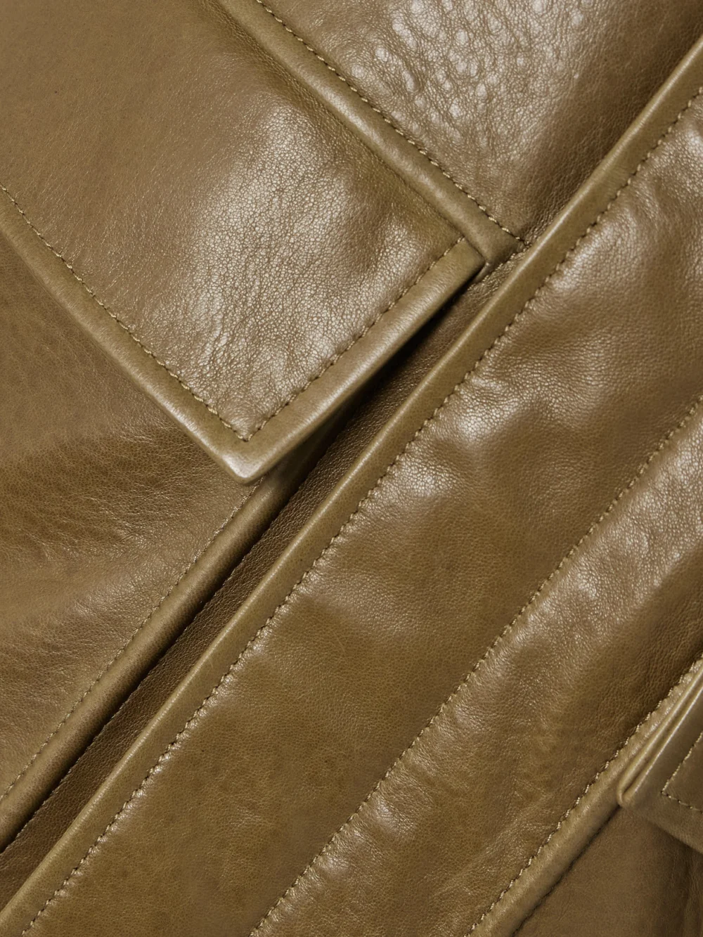 Close-up detail of the Nour Hammour Drey Textured-leather Jacket