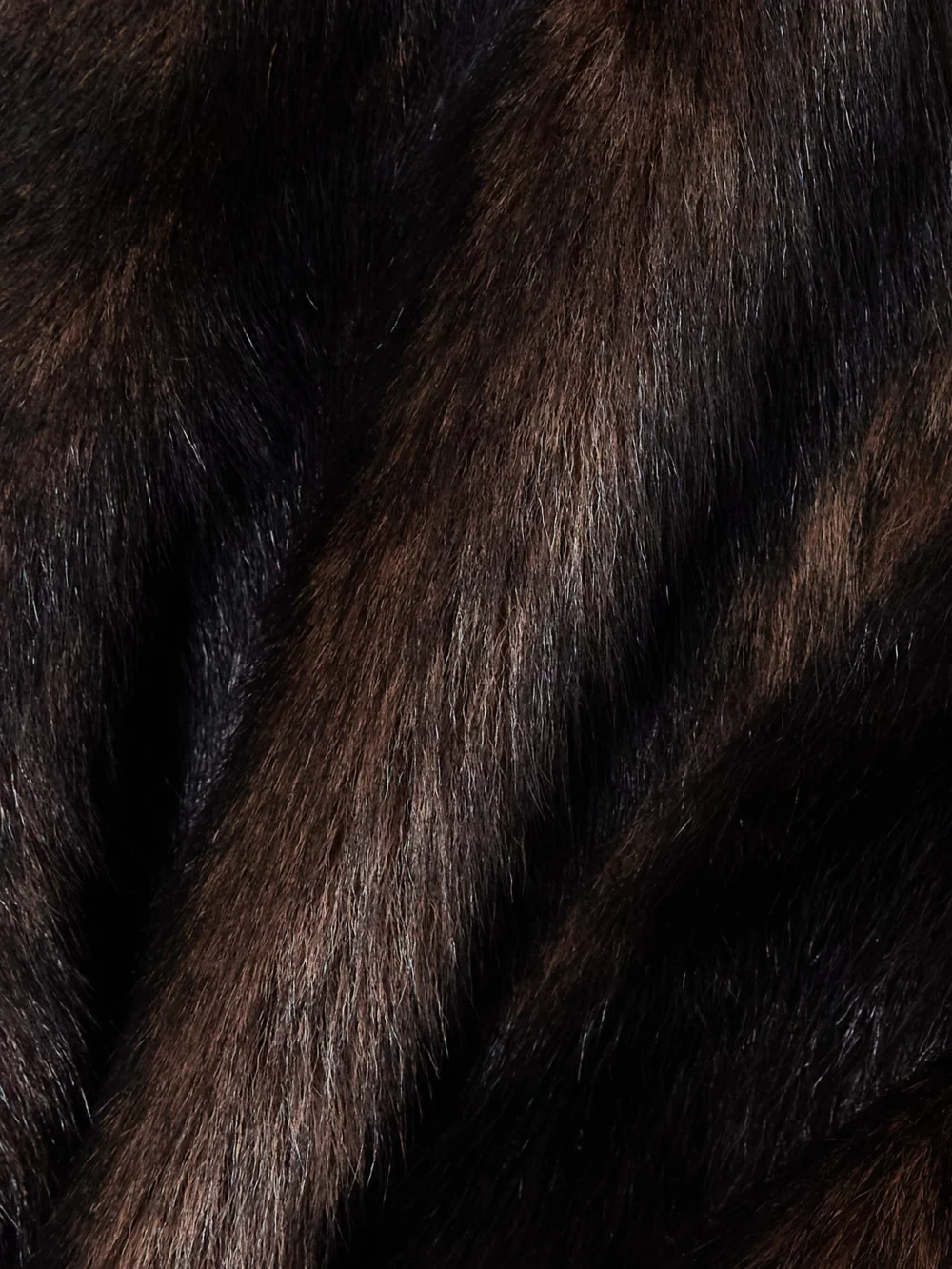 Close-up detail of the Nour Hammour Elsa Belted Shearling Jacket