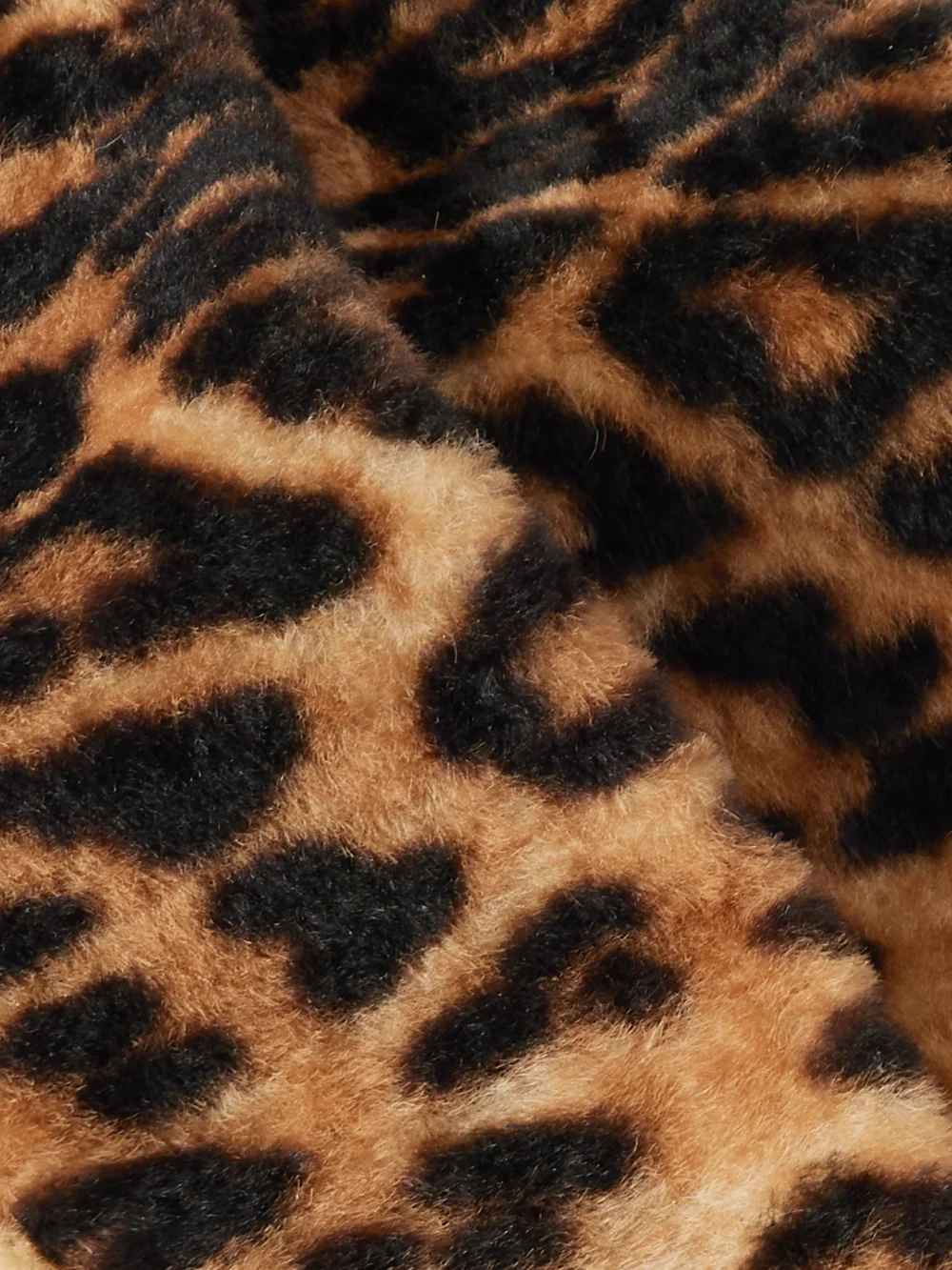 Close-up detail of the Nour Hammour Sash Leopard-print Shearling Belt