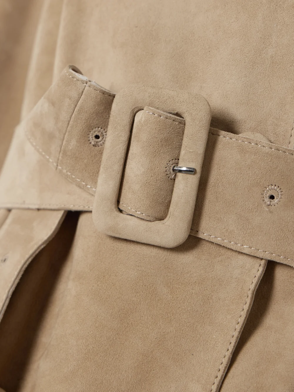 Close-up detail of the Nour Hammour Tate Belted Suede Trench Coat
