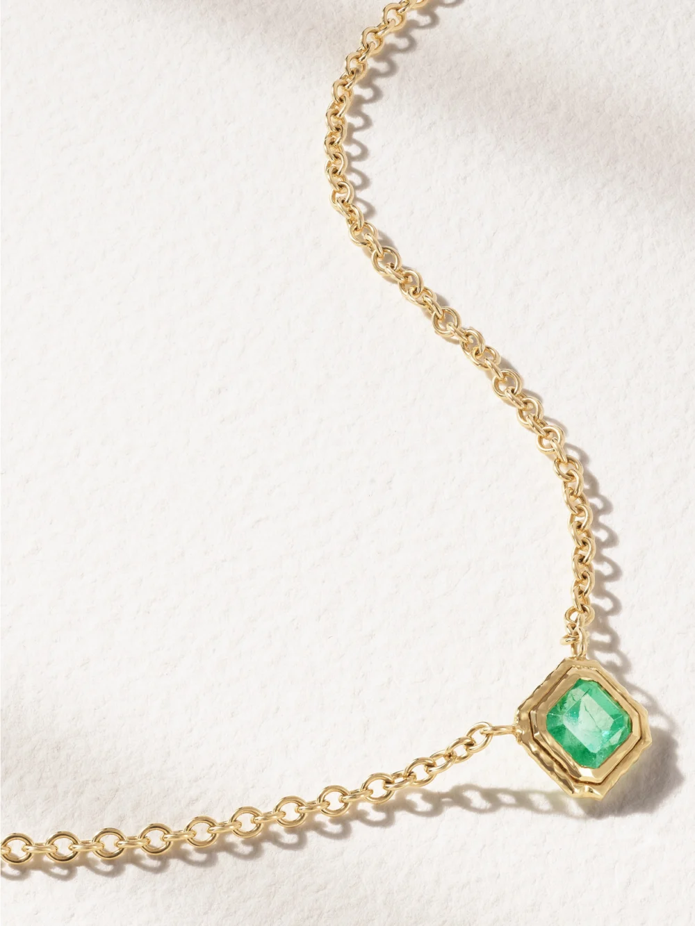 Close-up detail of the Octavia Elizabeth Seagrape 18-karat Recycled Gold Emerald Necklace